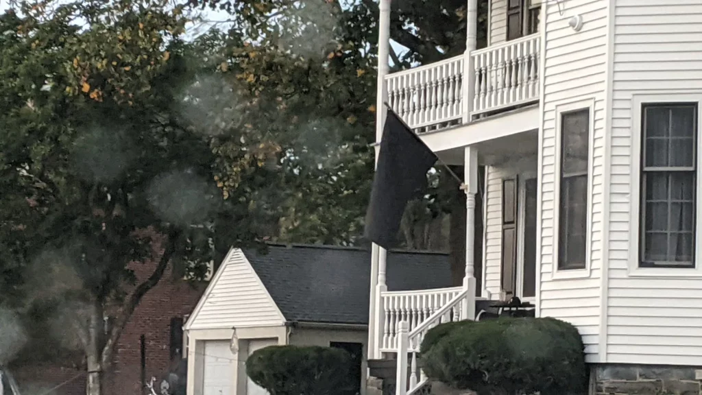 What Does a Solid Black Flag Mean on a House